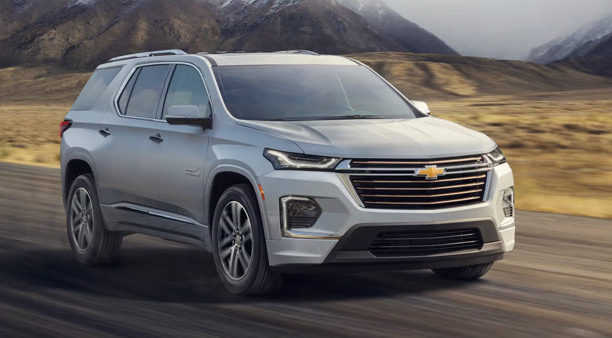 Silver 2022 Chevy Traverse driving